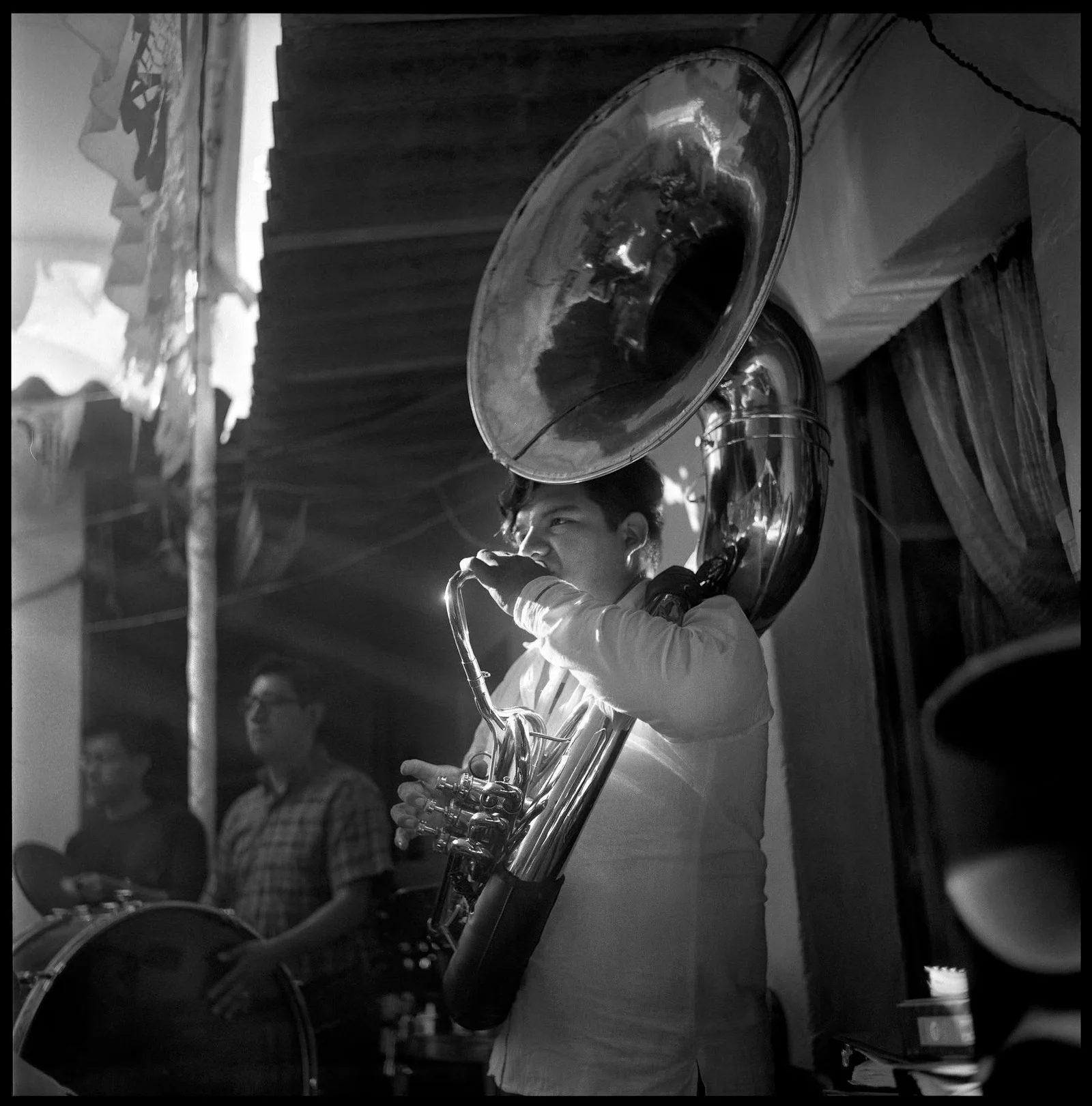 A young man playing tuba, from Citlali Fabián's community series in Yalálag. Photo: Citlali Fabián A young man playing tuba, from Citlali Fabián's community series in Yalálag. Photo: Citlali Fabián